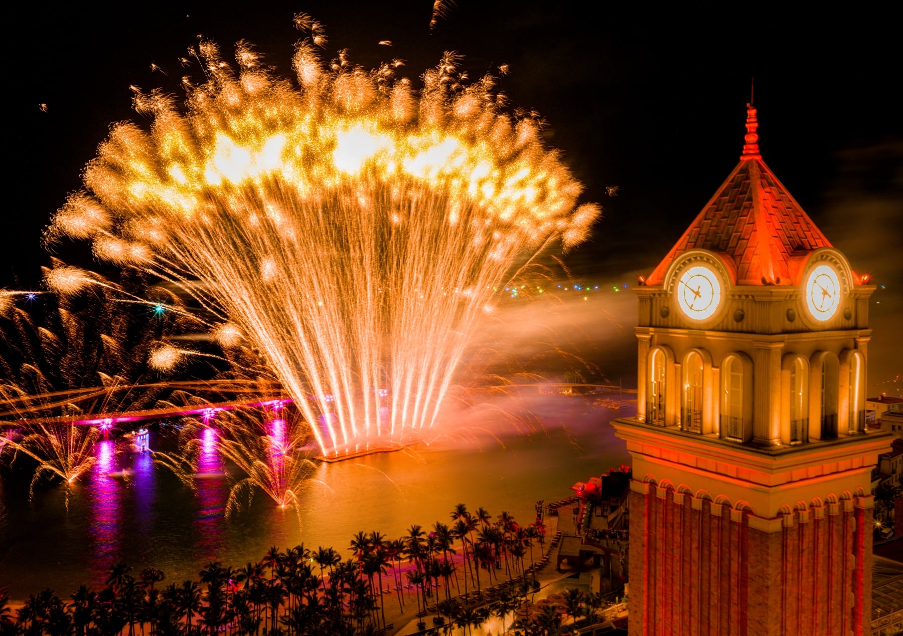 The Symphony of the Sea show lights up the sky over Pearl Island with dazzling fireworks.jpg